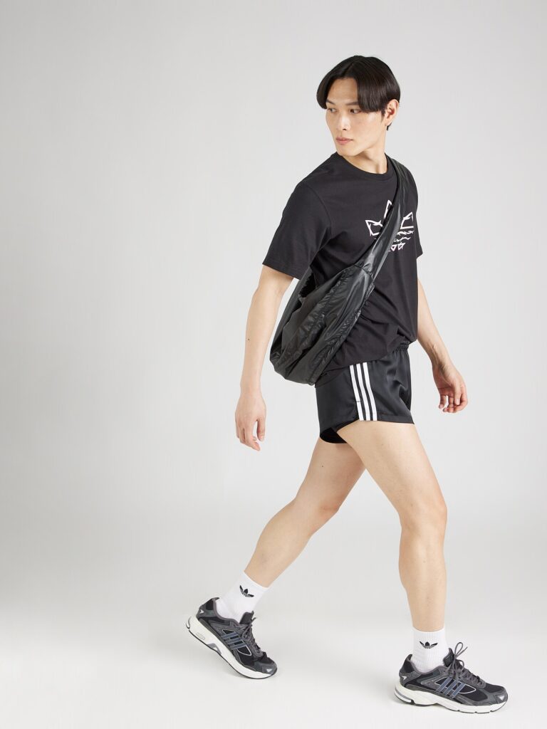 Cumpăra ADIDAS ORIGINALS Pantaloni 'Pride'  negru / alb