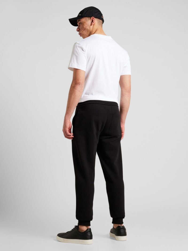 Calvin Klein Jeans Pantaloni  negru / alb preţ