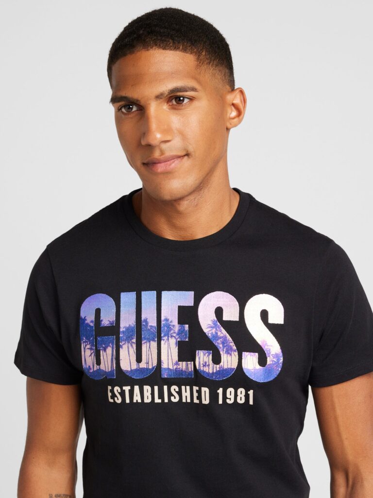 GUESS Tricou 'CITY OF PALMS'  lila / portocaliu caisă / negru preţ