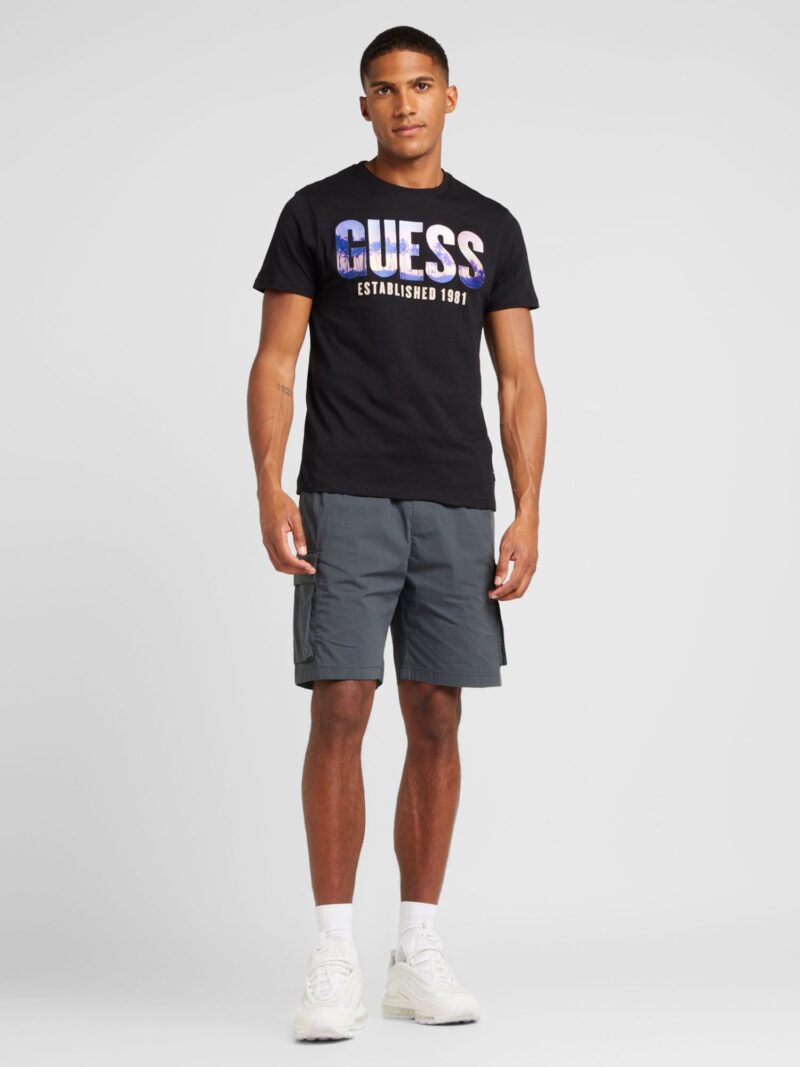 Cumpăra GUESS Tricou 'CITY OF PALMS'  lila / portocaliu caisă / negru