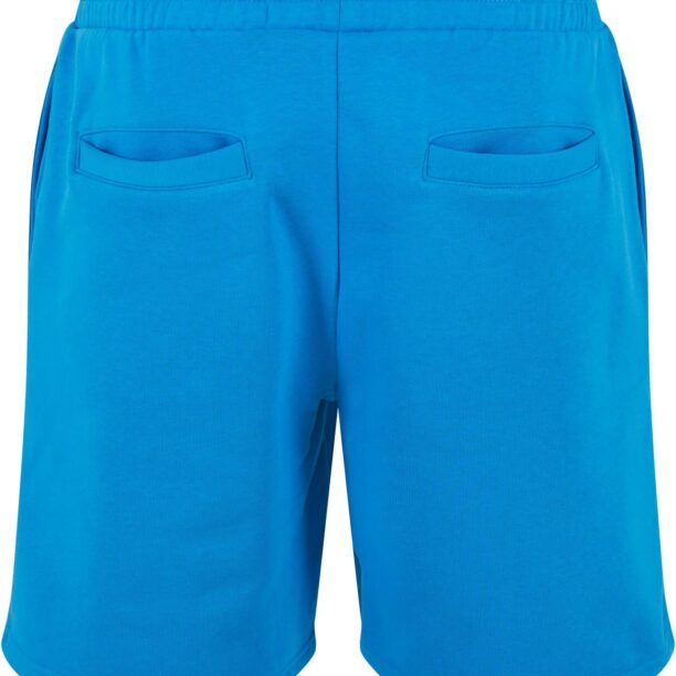 Karl Kani Pantaloni  albastru aqua / alb