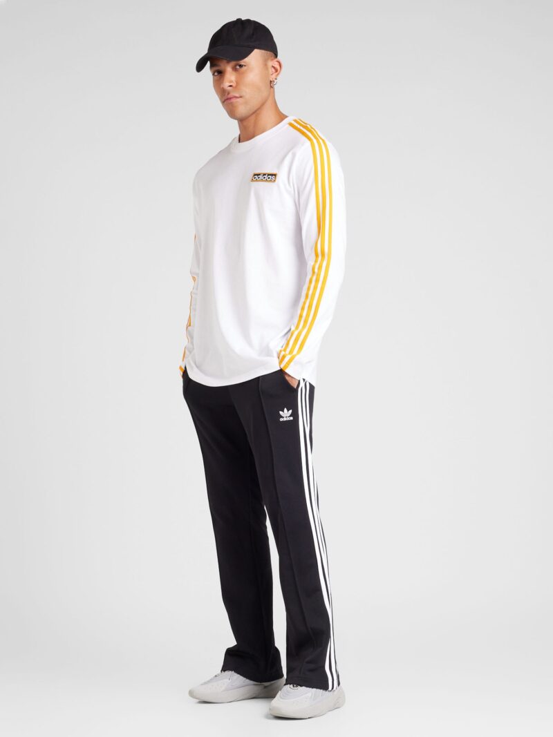 ADIDAS ORIGINALS Pantaloni '70s'  negru / alb