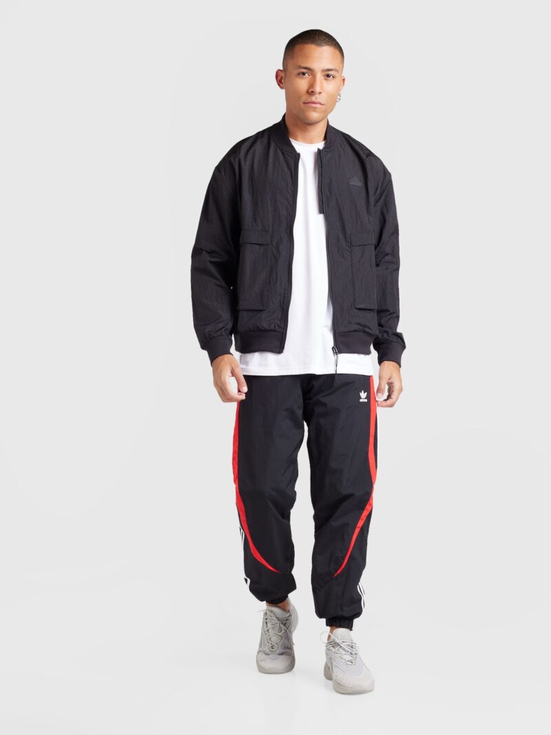 Cumpăra ADIDAS ORIGINALS Pantaloni 'Archive'  portocaliu / negru / alb