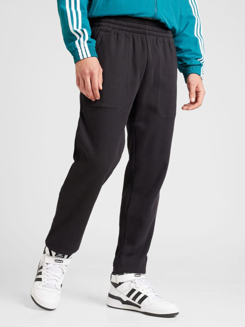 Cumpăra ADIDAS ORIGINALS Pantaloni 'ESS'  negru