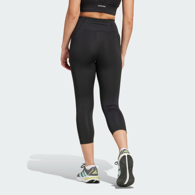 Cumpăra ADIDAS PERFORMANCE Pantaloni sport 'Own the Run'  negru / alb