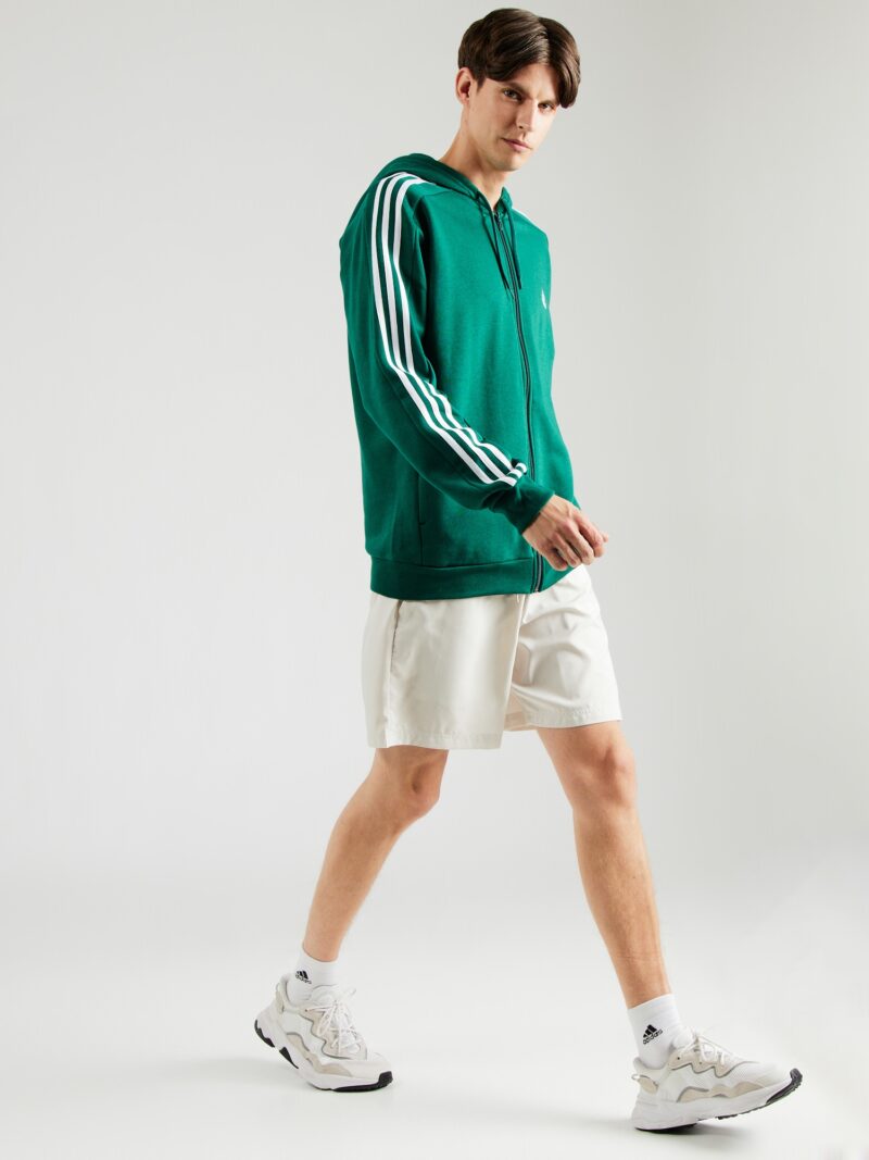 Cumpăra ADIDAS SPORTSWEAR Bluză cu fermoar sport 'Essentials'  verde / alb murdar