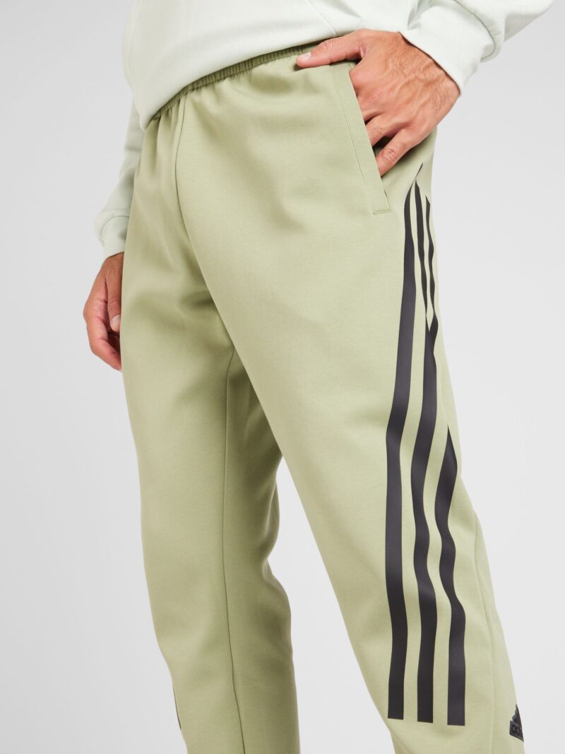 Cumpăra ADIDAS SPORTSWEAR Pantaloni sport 'Future Icons'  oliv / verde deschis / negru