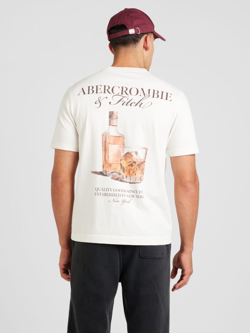 Abercrombie & Fitch Tricou 'SEASONAL IMAGERY'  maro coniac / brocart / maro închis / alb lână preţ