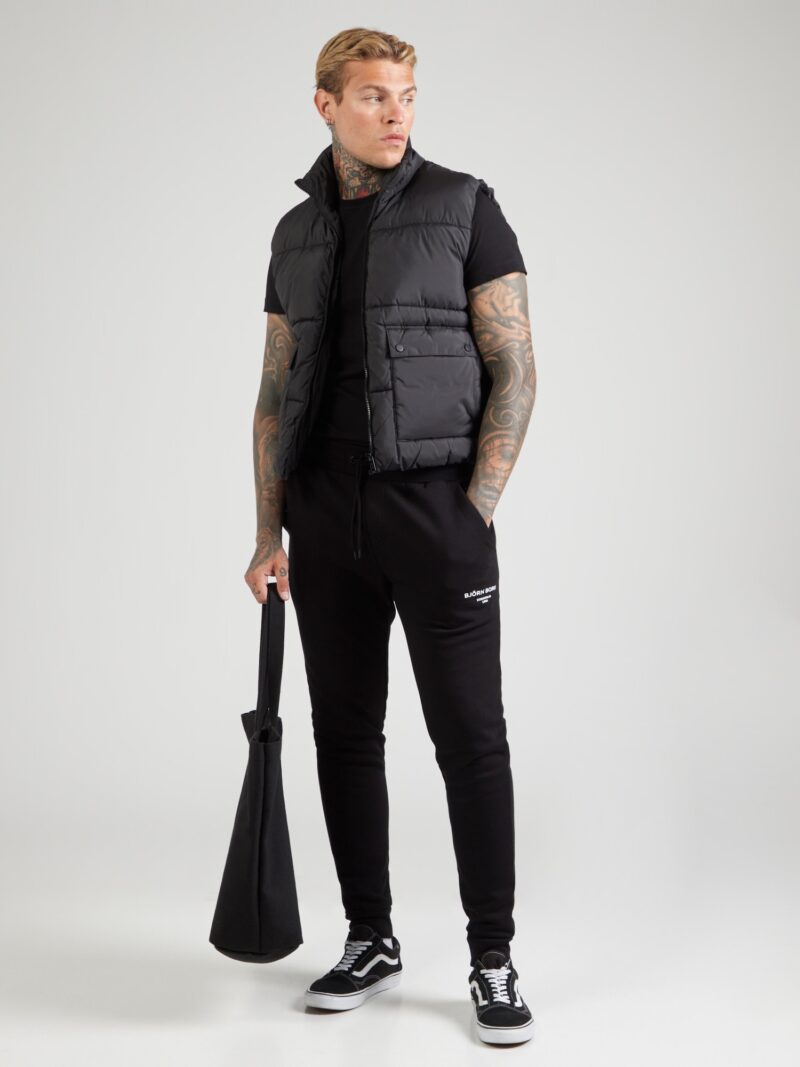 Cumpăra BJÖRN BORG Pantaloni sport 'ESSENTIAL'  negru / alb