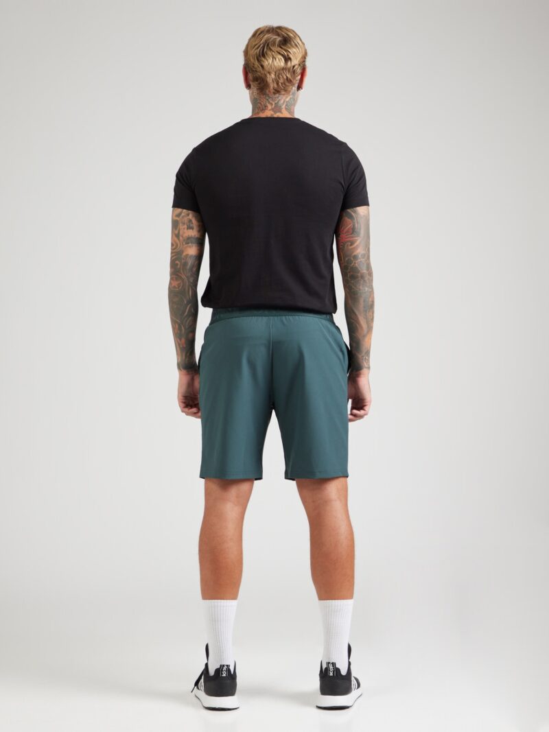 BJÖRN BORG Pantaloni sport  verde smarald preţ