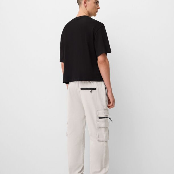 Bershka Pantaloni cu buzunare  gri deschis / negru preţ