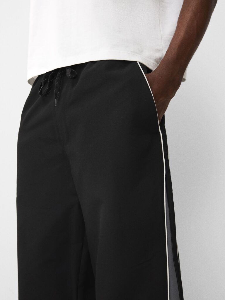 Bershka Pantaloni  gri / negru / alb preţ