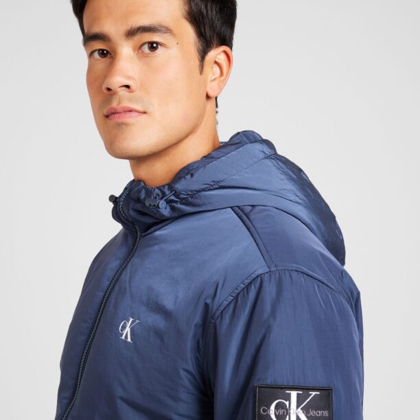 Calvin Klein Jeans Geacă de primăvară-toamnă 'HARRINGTON'  albastru / negru / alb preţ