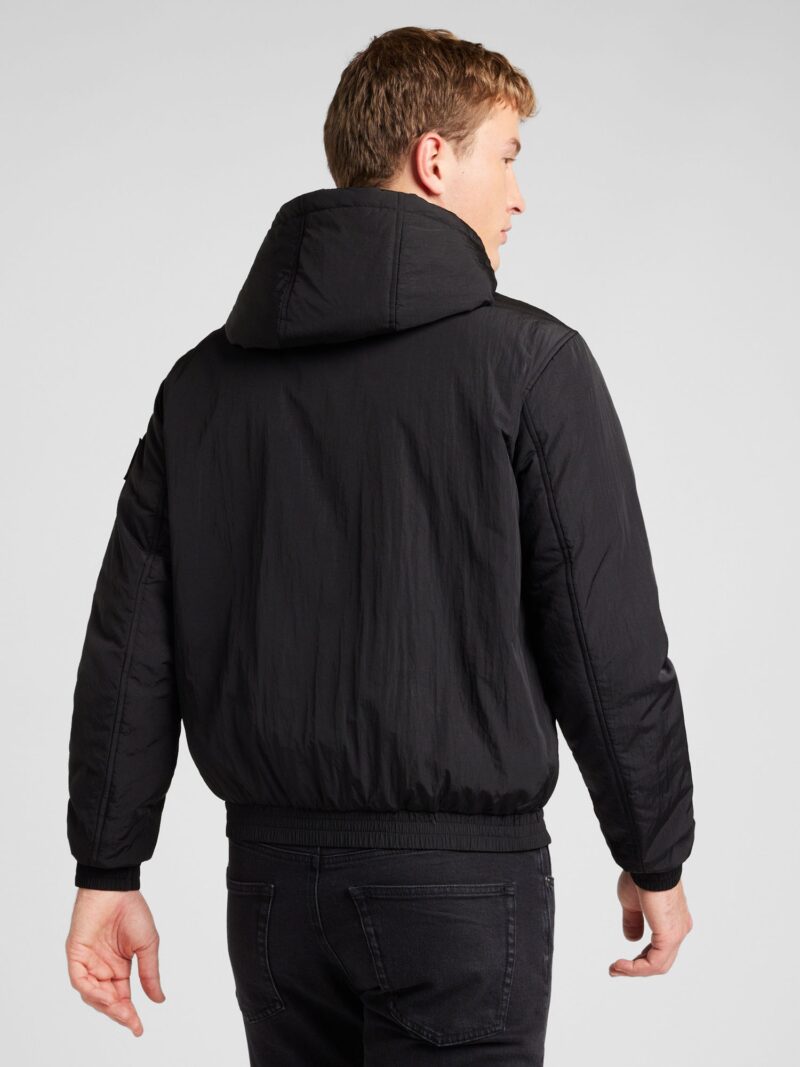 Cumpăra Calvin Klein Jeans Geacă de primăvară-toamnă 'HARRINGTON'  negru / alb