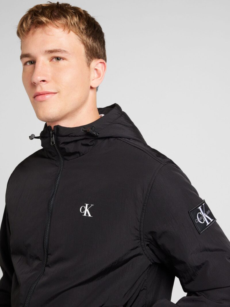 Calvin Klein Jeans Geacă de primăvară-toamnă 'HARRINGTON'  negru / alb