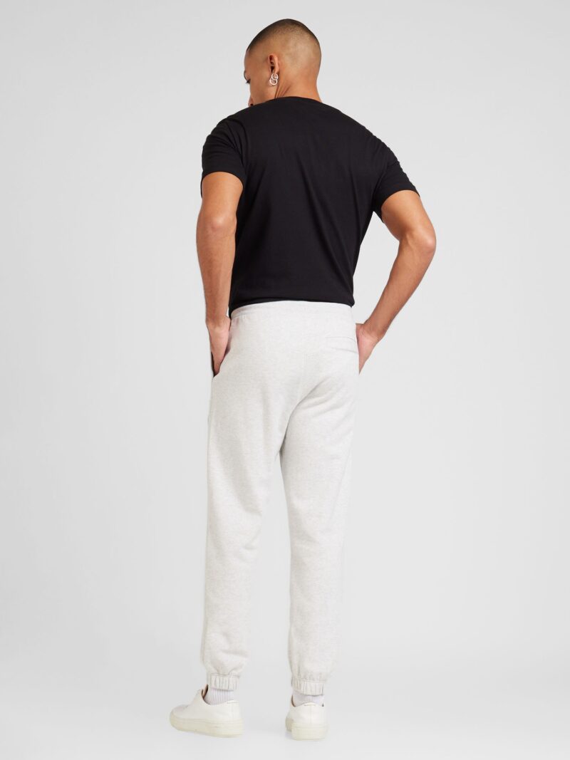 Preţ Calvin Klein Jeans Pantaloni  gri amestecat / alb