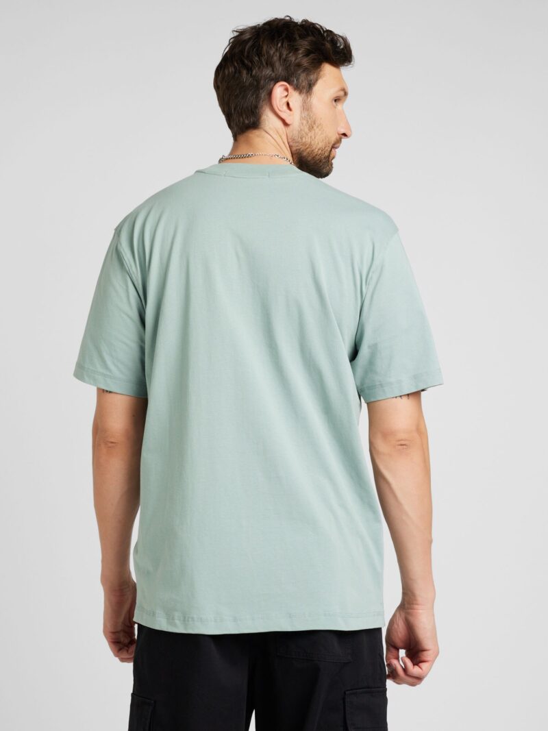 Calvin Klein Jeans Tricou  verde pastel / negru / alb preţ