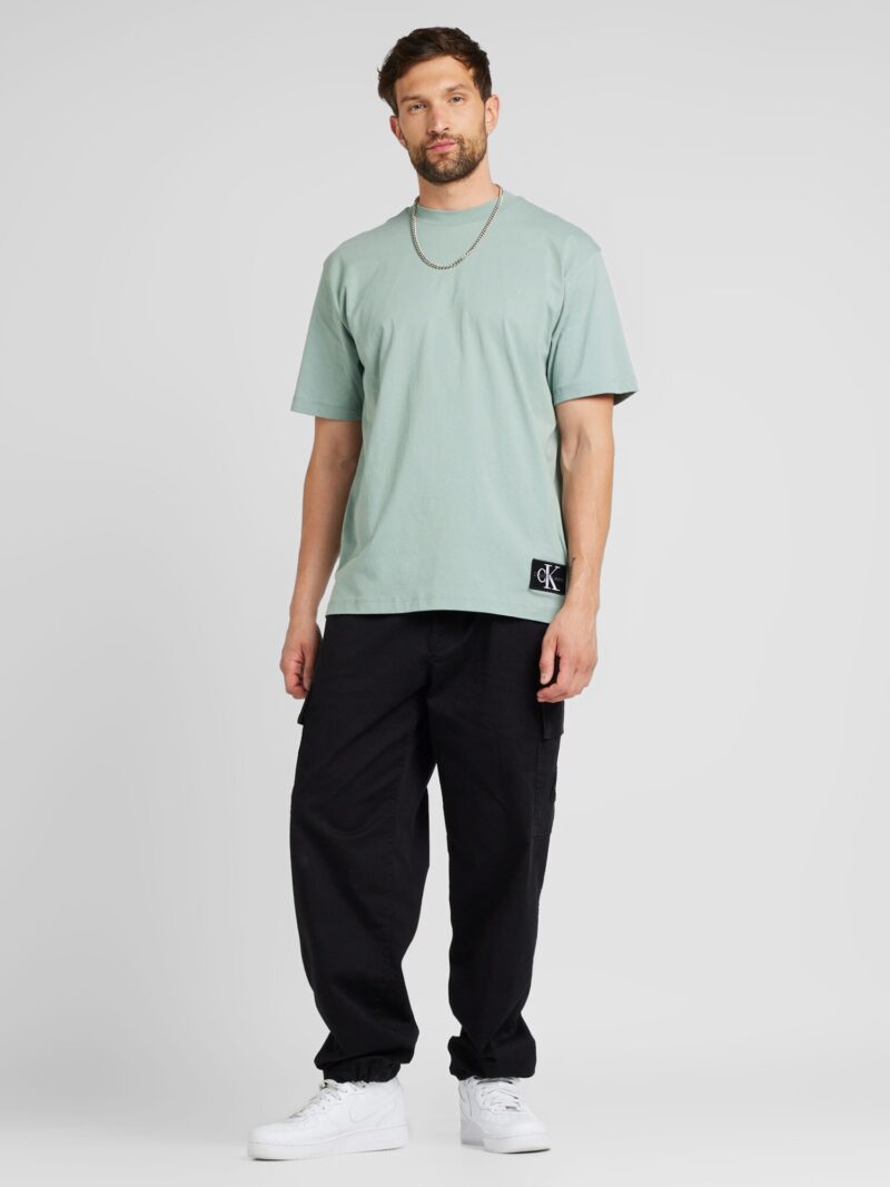 Preţ Calvin Klein Jeans Tricou  verde pastel / negru / alb