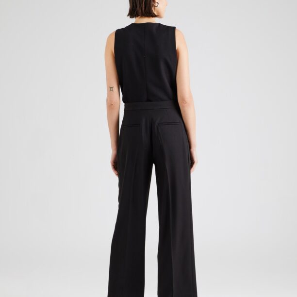 Calvin Klein Pantaloni cu dungă  negru preţ