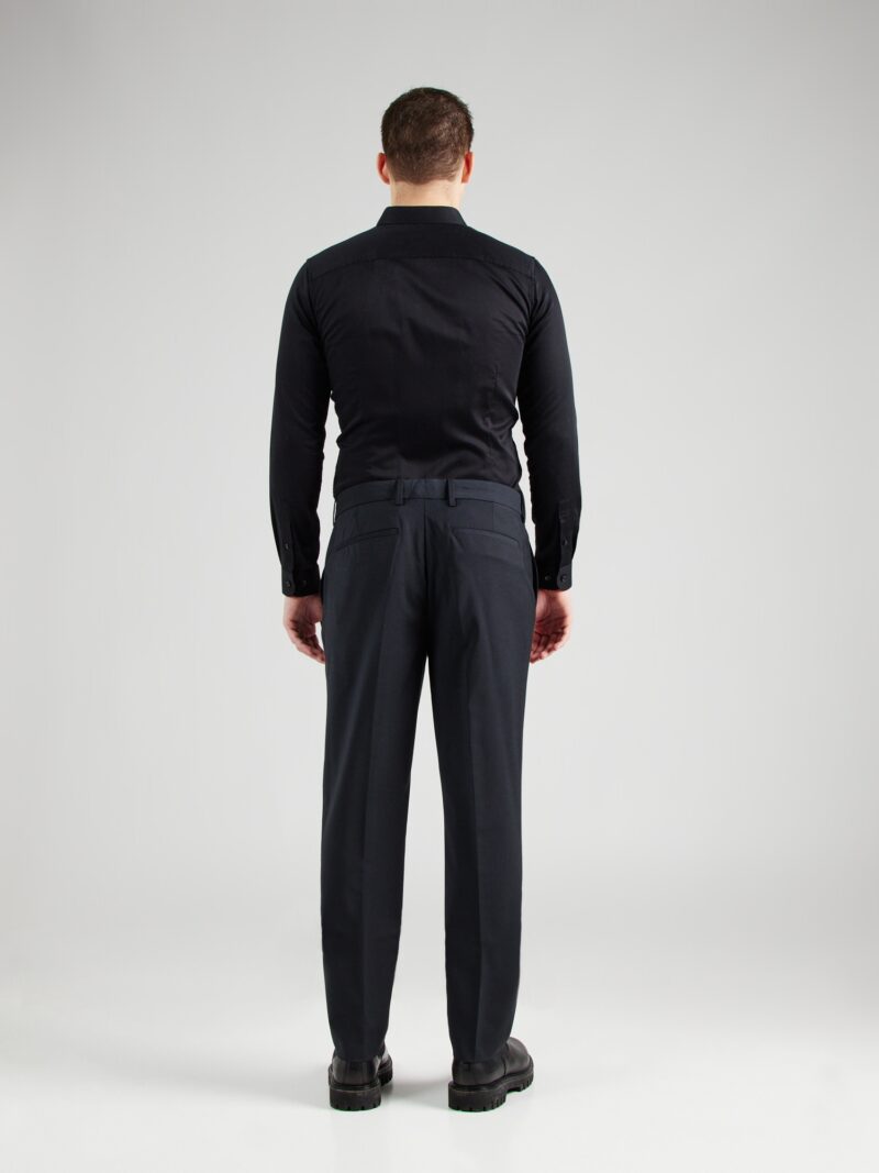 Calvin Klein Pantaloni cu dungă  negru preţ