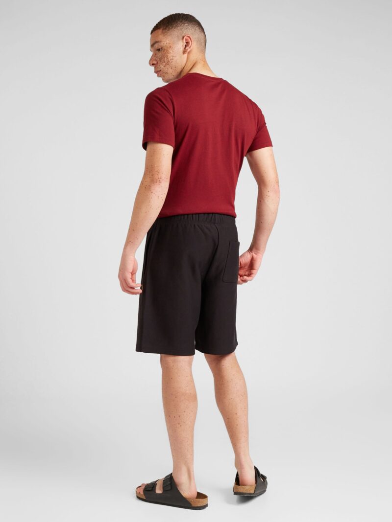 Carhartt WIP Pantaloni  galben / roșu bordeaux / negru preţ