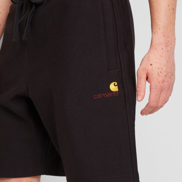 Cumpăra Carhartt WIP Pantaloni  galben / roșu bordeaux / negru