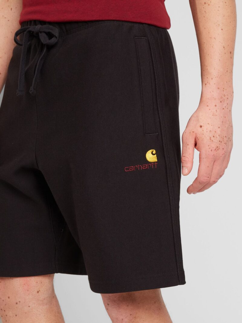 Cumpăra Carhartt WIP Pantaloni  galben / roșu bordeaux / negru