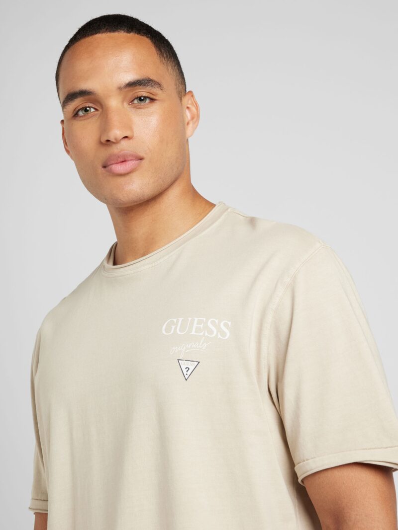 GUESS Originals Tricou  bej deschis / negru / alb murdar preţ