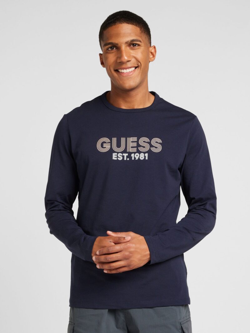 Cumpăra GUESS Tricou  bej deschis / bleumarin / alb