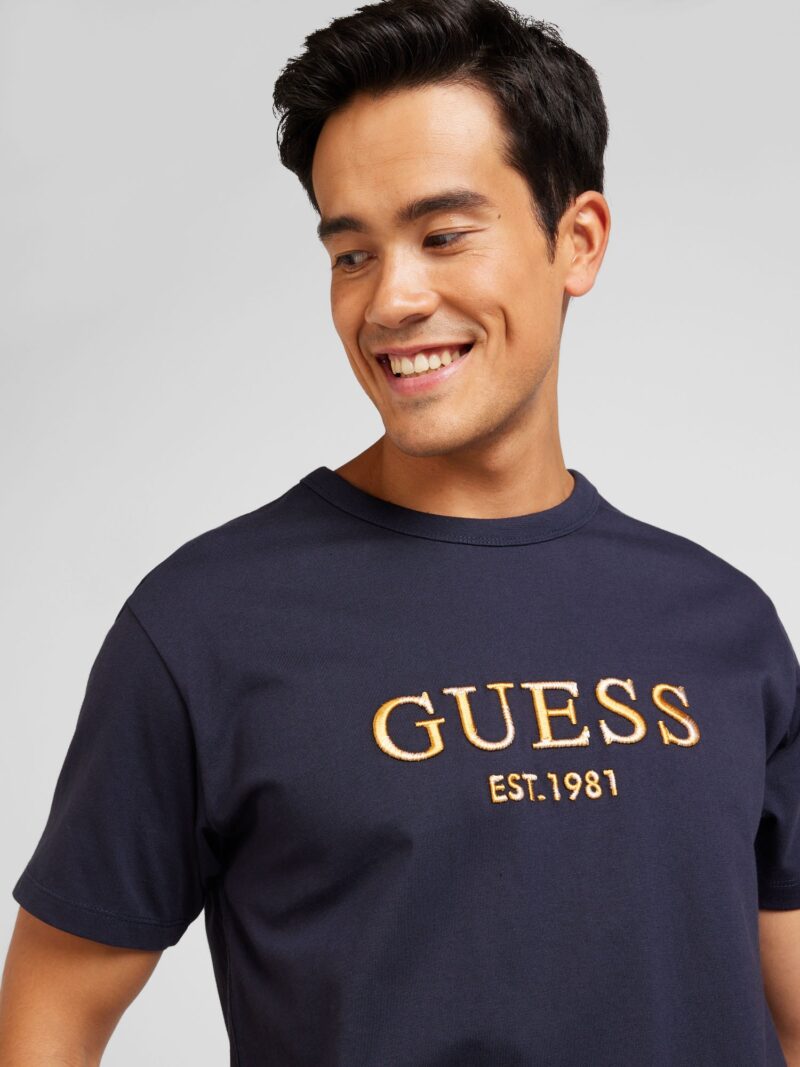 Cumpăra GUESS Tricou  bleumarin / galben curry