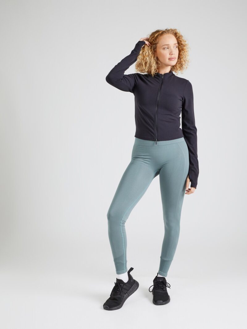 Cumpăra Hummel Pantaloni sport 'Tif'  verde pastel / negru