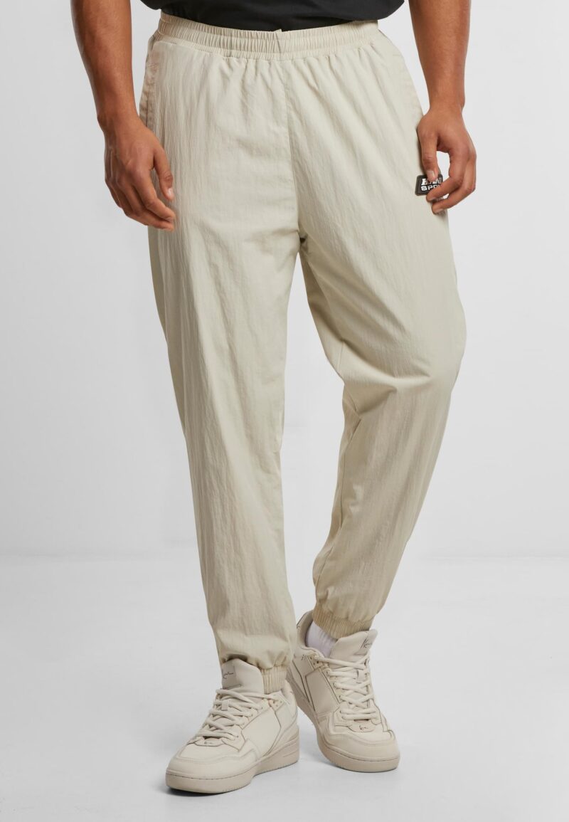 Karl Kani Pantaloni sport 'Patch Essential'  bej / nisipiu preţ