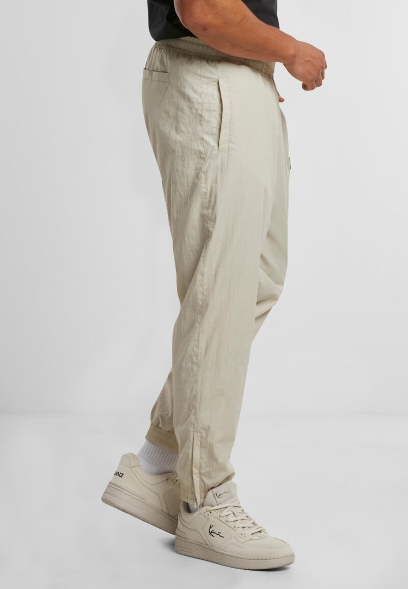 Original Karl Kani Pantaloni sport 'Patch Essential'  bej / nisipiu