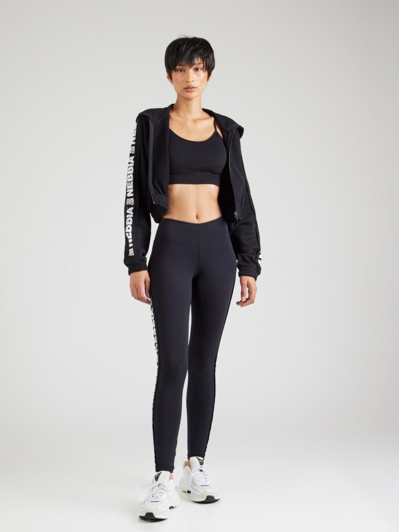 Cumpăra NEBBIA Pantaloni sport  negru / alb