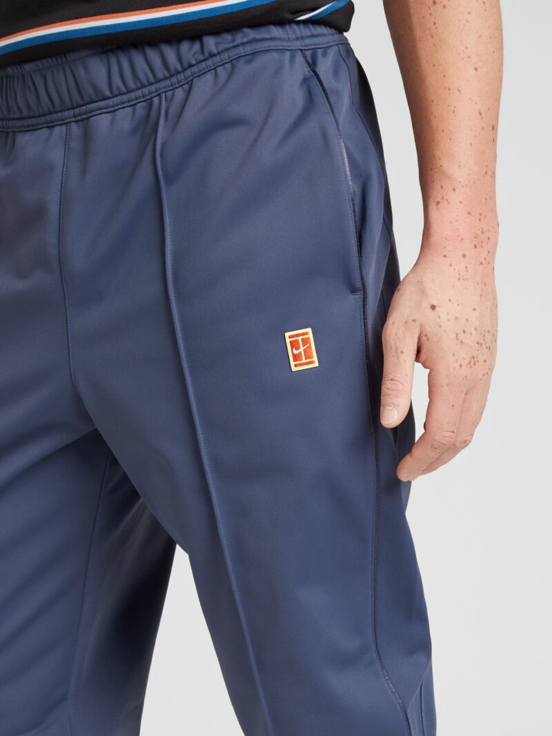 Cumpăra NIKE Pantaloni sport 'Court HERITAGE'  bleumarin