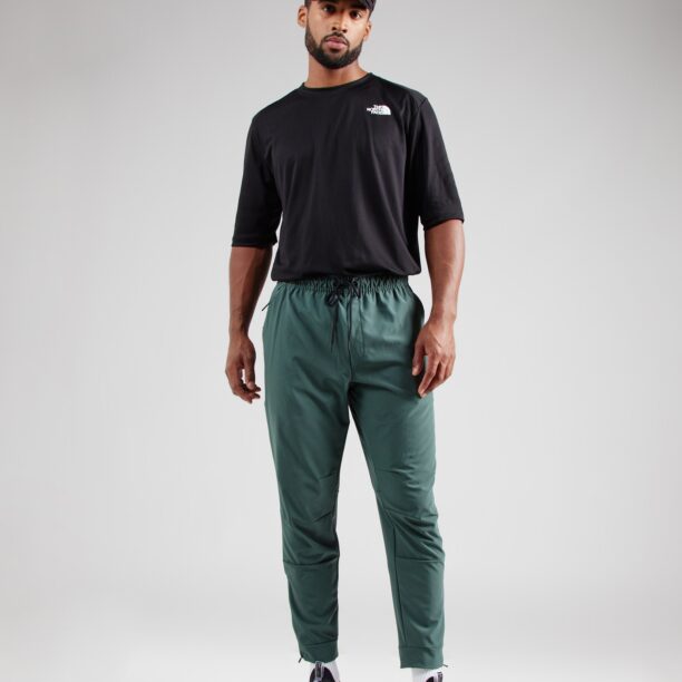 Cumpăra NIKE Pantaloni sport 'UNLIMITED'  verde smarald