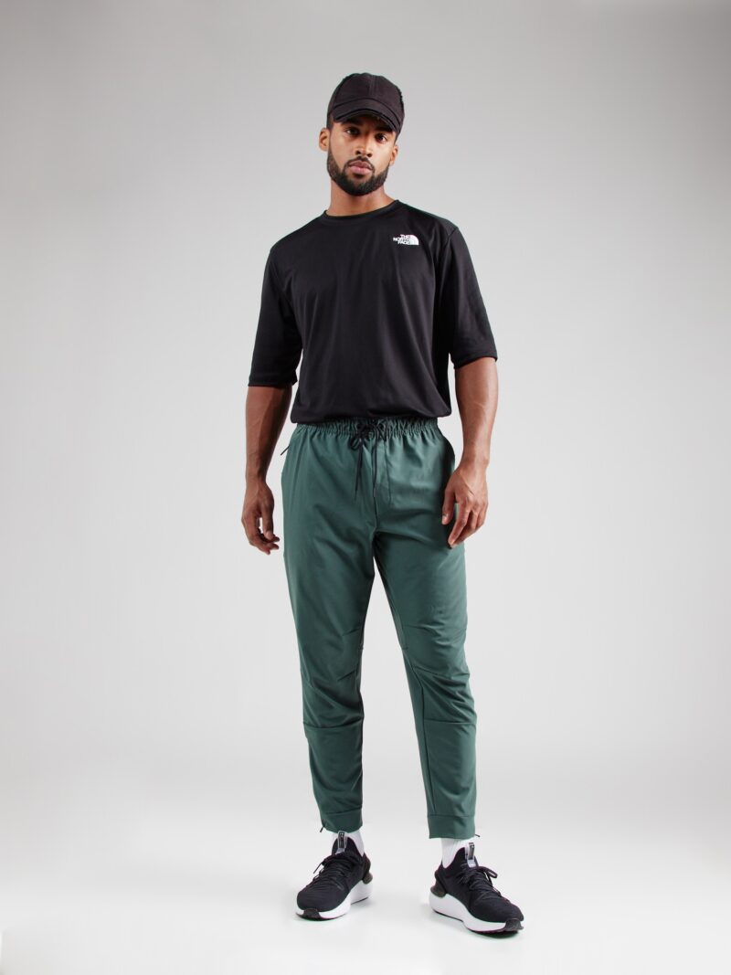 Cumpăra NIKE Pantaloni sport 'UNLIMITED'  verde smarald