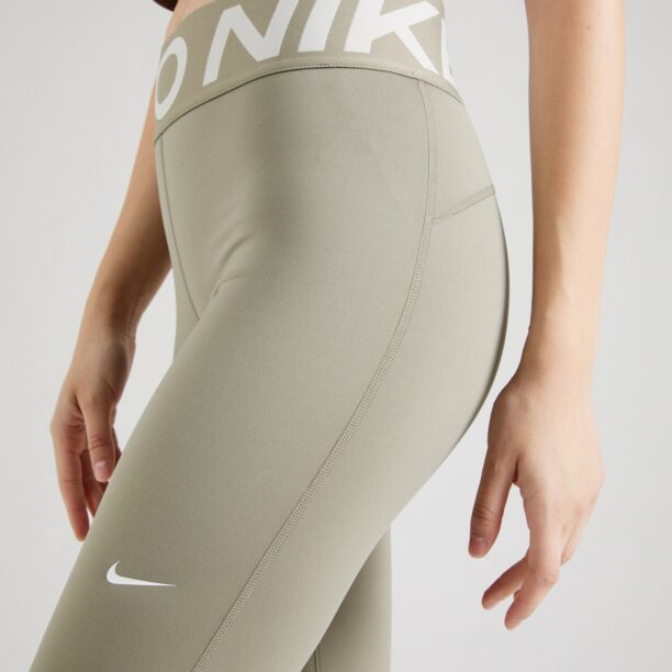 Preţ NIKE Pantaloni sport  verde pastel / alb