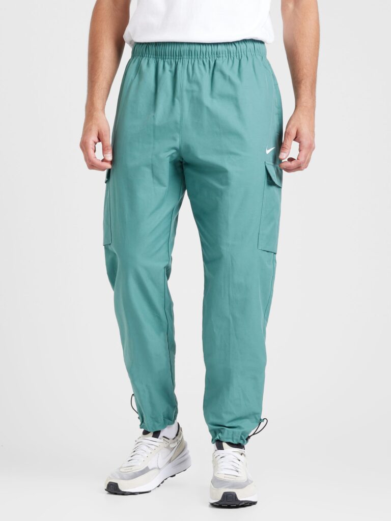 Nike Sportswear Pantaloni cu buzunare 'AIR PLAY'  turcoaz preţ