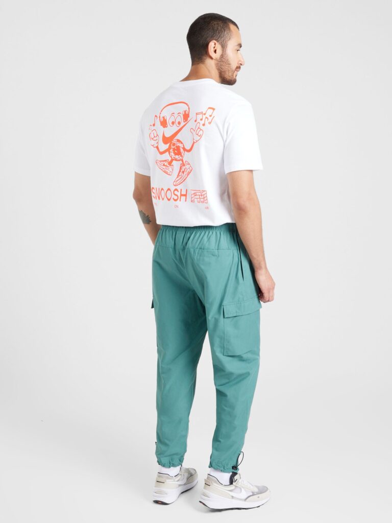 Cumpăra Nike Sportswear Pantaloni cu buzunare 'AIR PLAY'  turcoaz