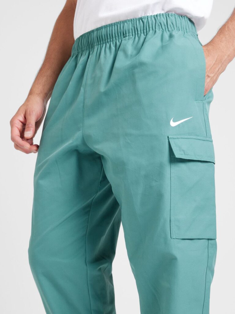 Preţ Nike Sportswear Pantaloni cu buzunare 'AIR PLAY'  turcoaz