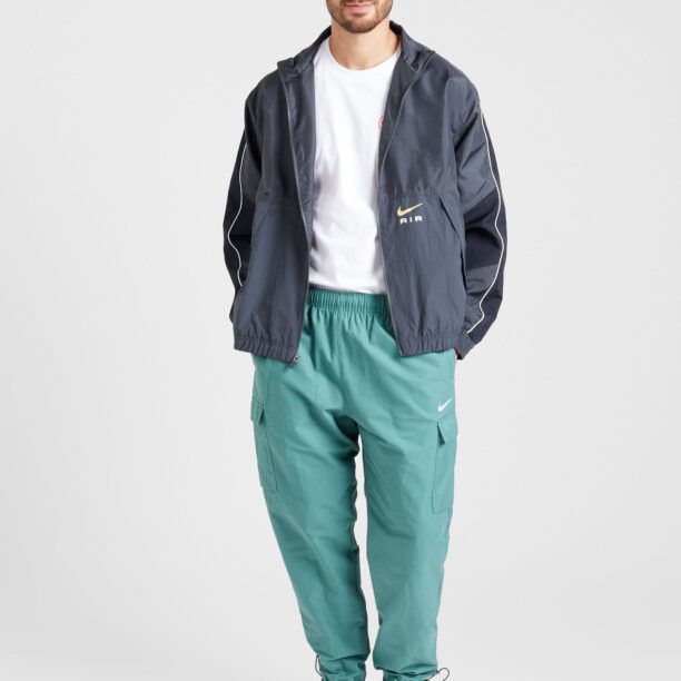 Nike Sportswear Pantaloni cu buzunare 'AIR PLAY'  turcoaz