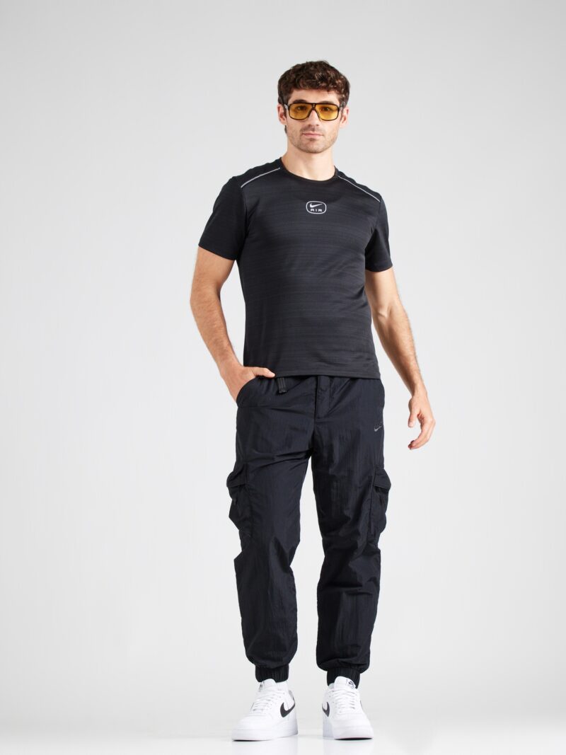 Cumpăra Nike Sportswear Pantaloni cu buzunare  negru