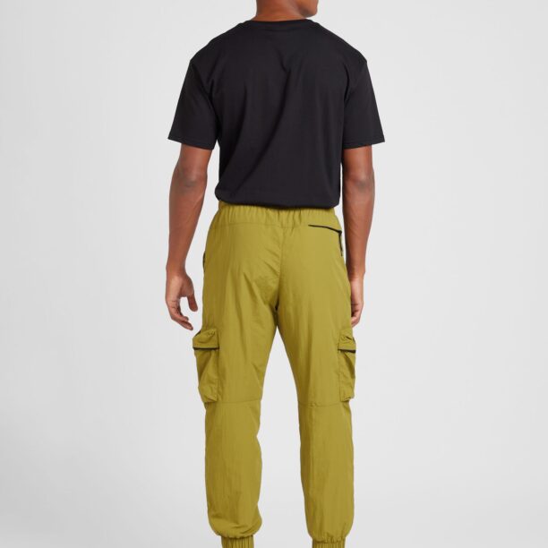 Nike Sportswear Pantaloni cu buzunare  verde kiwi / negru preţ