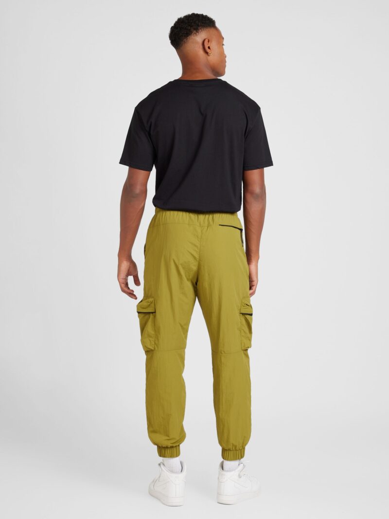 Nike Sportswear Pantaloni cu buzunare  verde kiwi / negru preţ