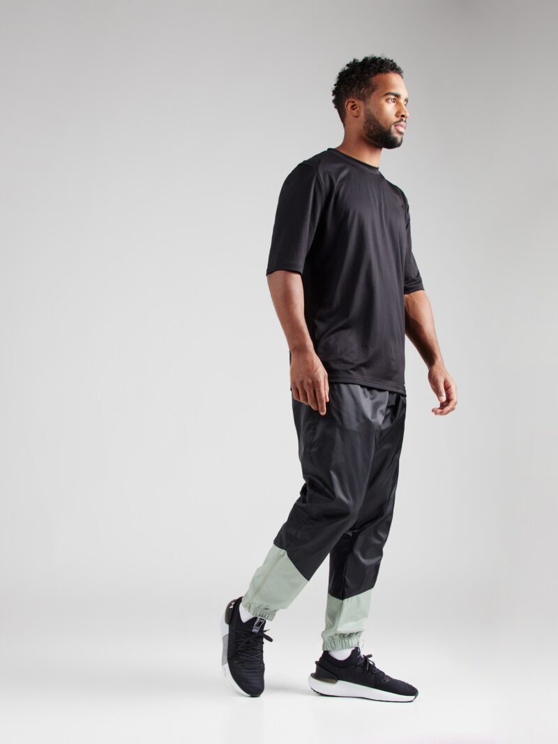 Preţ Nike Sportswear Pantaloni  verde mentă / negru