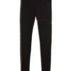 PUMA Pantaloni sport 'ESS'  auriu / negru