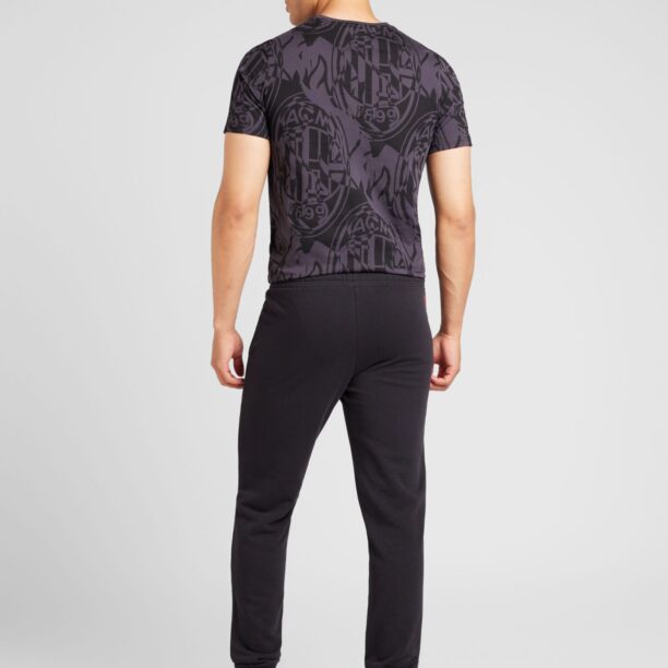 Cumpăra PUMA Pantaloni sport  negru / alb