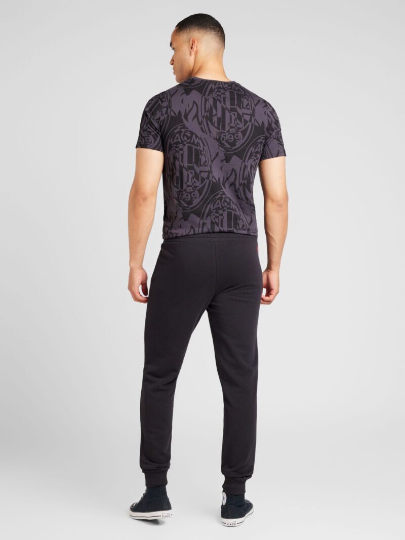 Cumpăra PUMA Pantaloni sport  negru / alb