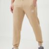 Puma pantaloni de trening T7 culoarea bej